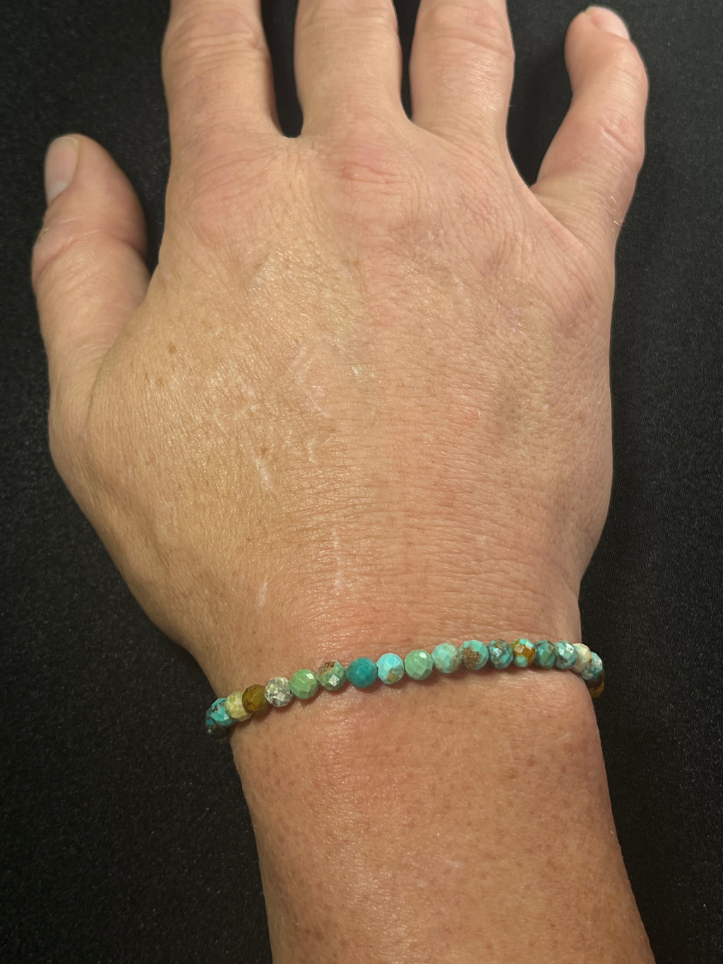 Turquoise gradient color style faceted round 5mm bead stretch bracelet; December birthstone