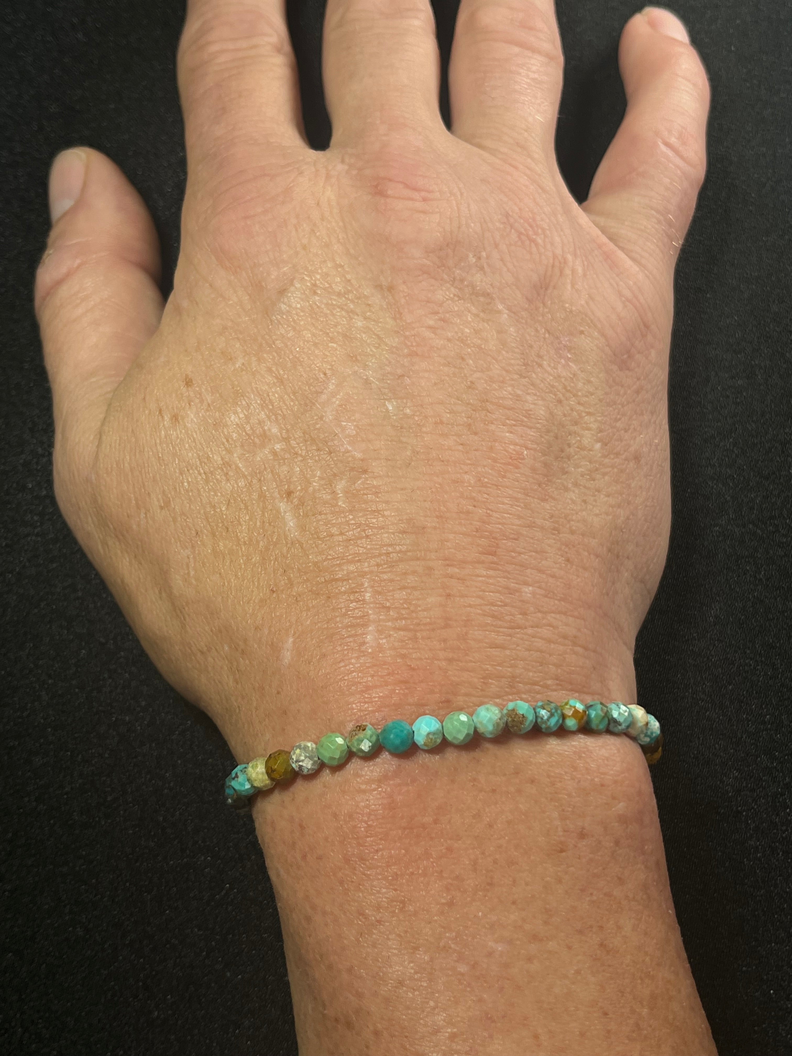 Turquoise gradient color style faceted round 5mm bead stretch bracelet; December birthstone