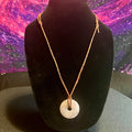 Rose Quartz 40mm donut pendant necklace w/ antique brown leather cord, sliding knots