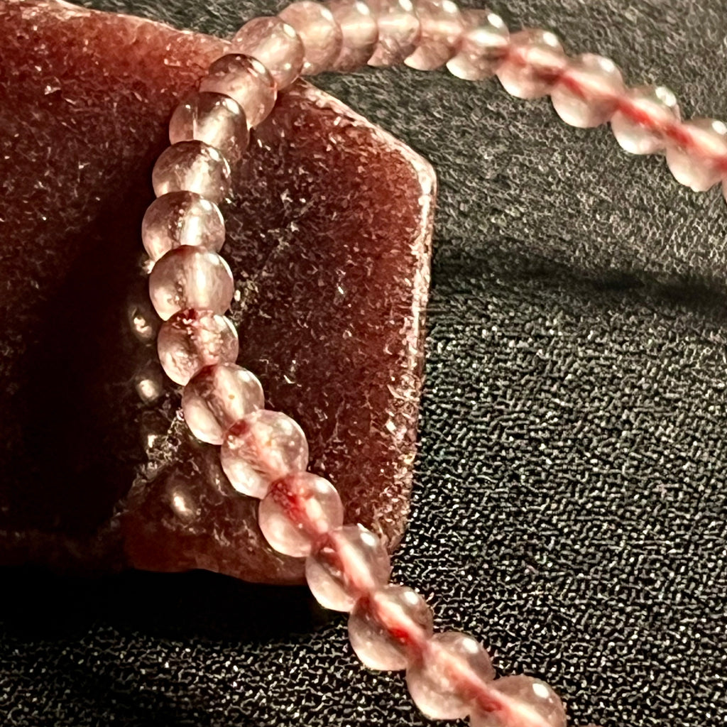 Light Strawberry Quartz smooth round 4mm bead stretch bracelet